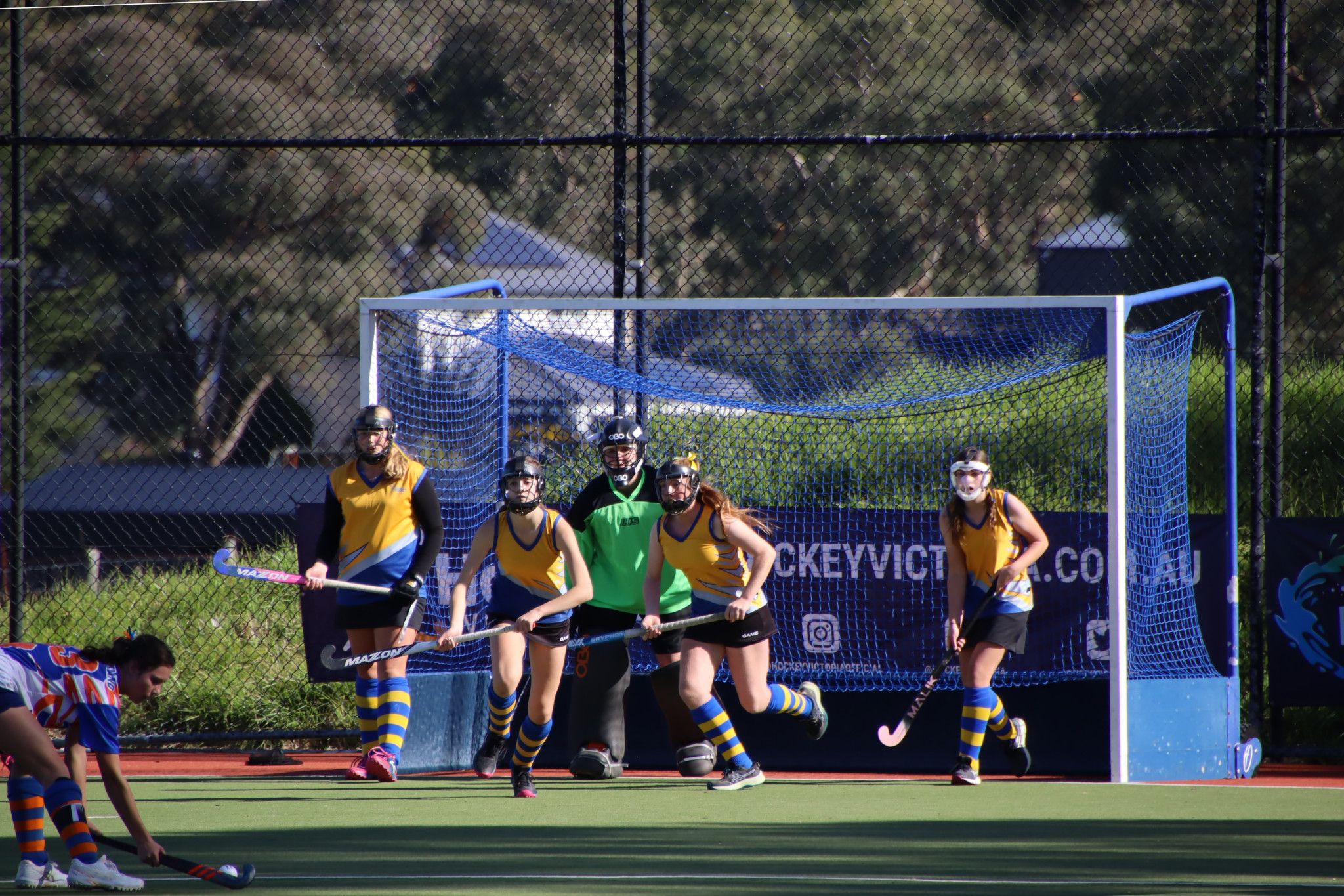 Wimmera defence: Ellie Williamson (left), goalie Madisson Bentley, and Lanie Clark (right) playing for Hockey Central Victora Under 14 Girls. PHOTO: RACHEL CLARK