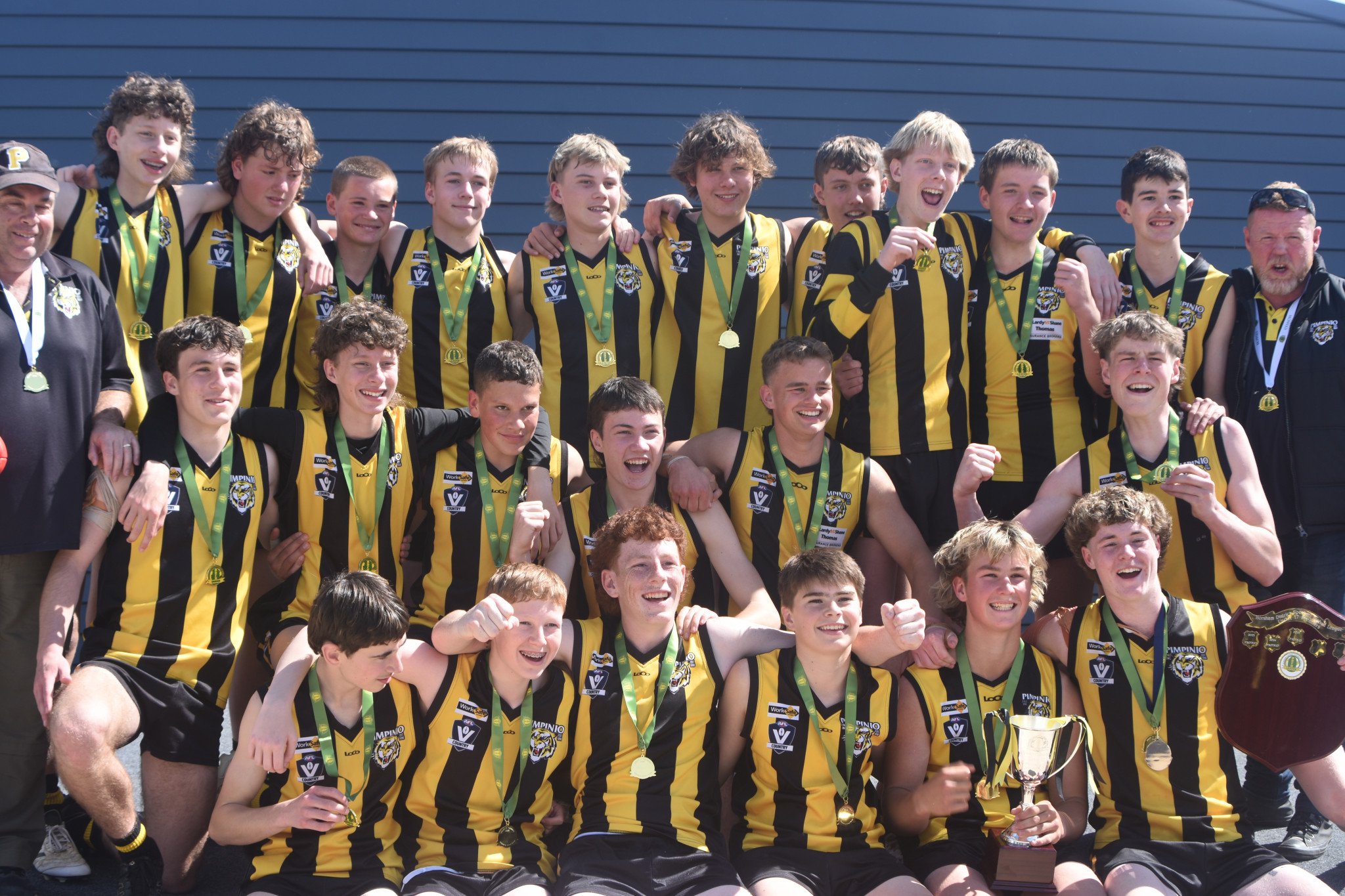 Pimpinio's under 17 football side celebrate their fourth straight premiership after defeating Kaniva Leeor Edenhope Apsley 52-50 in Saturday's grand final.