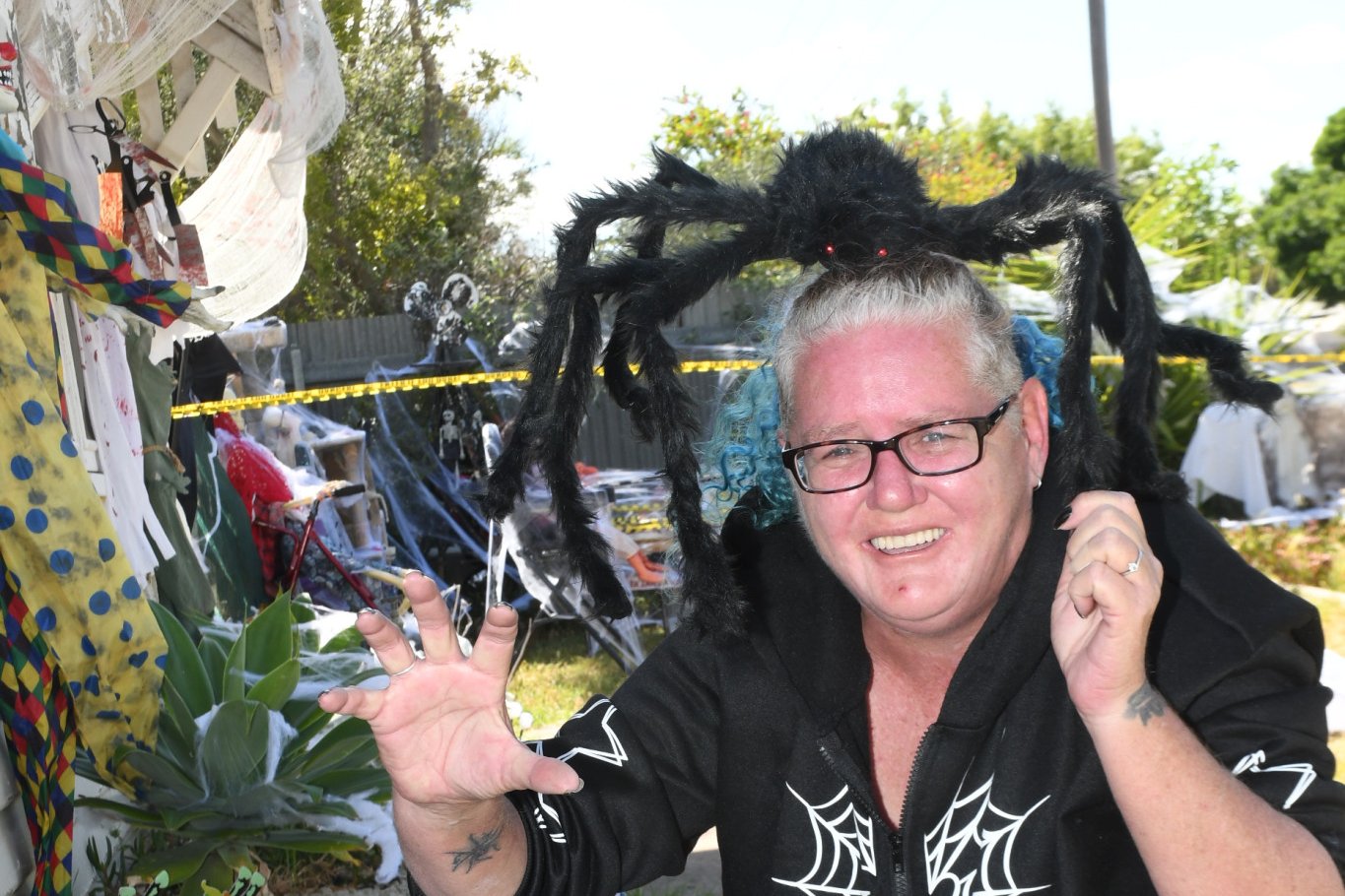 Surrounded in spiders and all things Halloween, Karen Torney has gone 'all out' for Halloween yesterday as a fund raiser for the 'Make a Wish Foundation" Donations can be made on a QR code at the house. Photo: DAVID WARD
