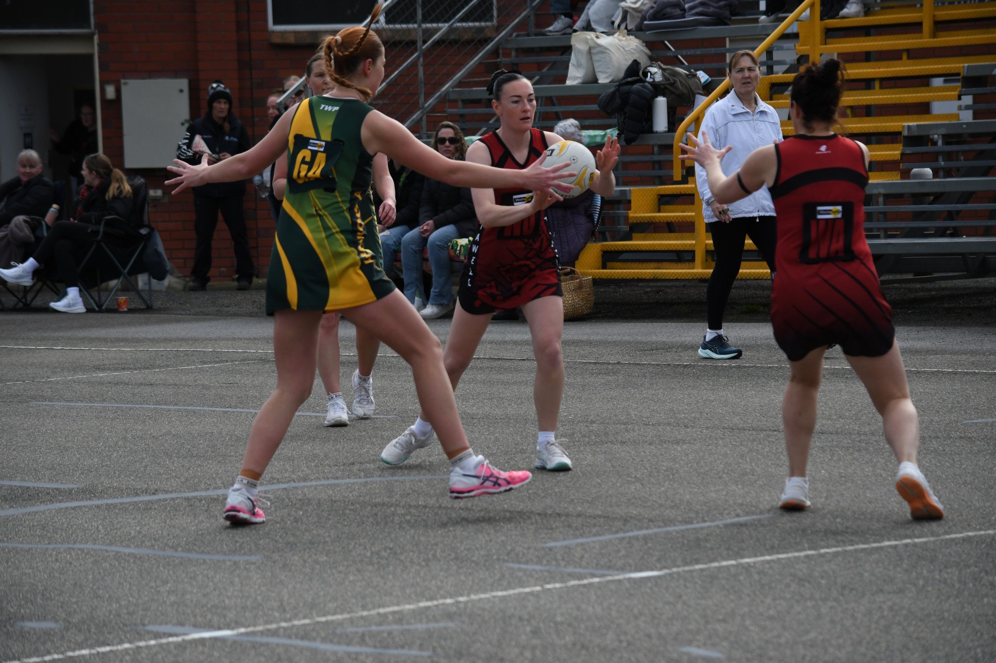 Meg Walker passes the ball to Jemma Clarkson. PHOTO: STEPHEN WALKER