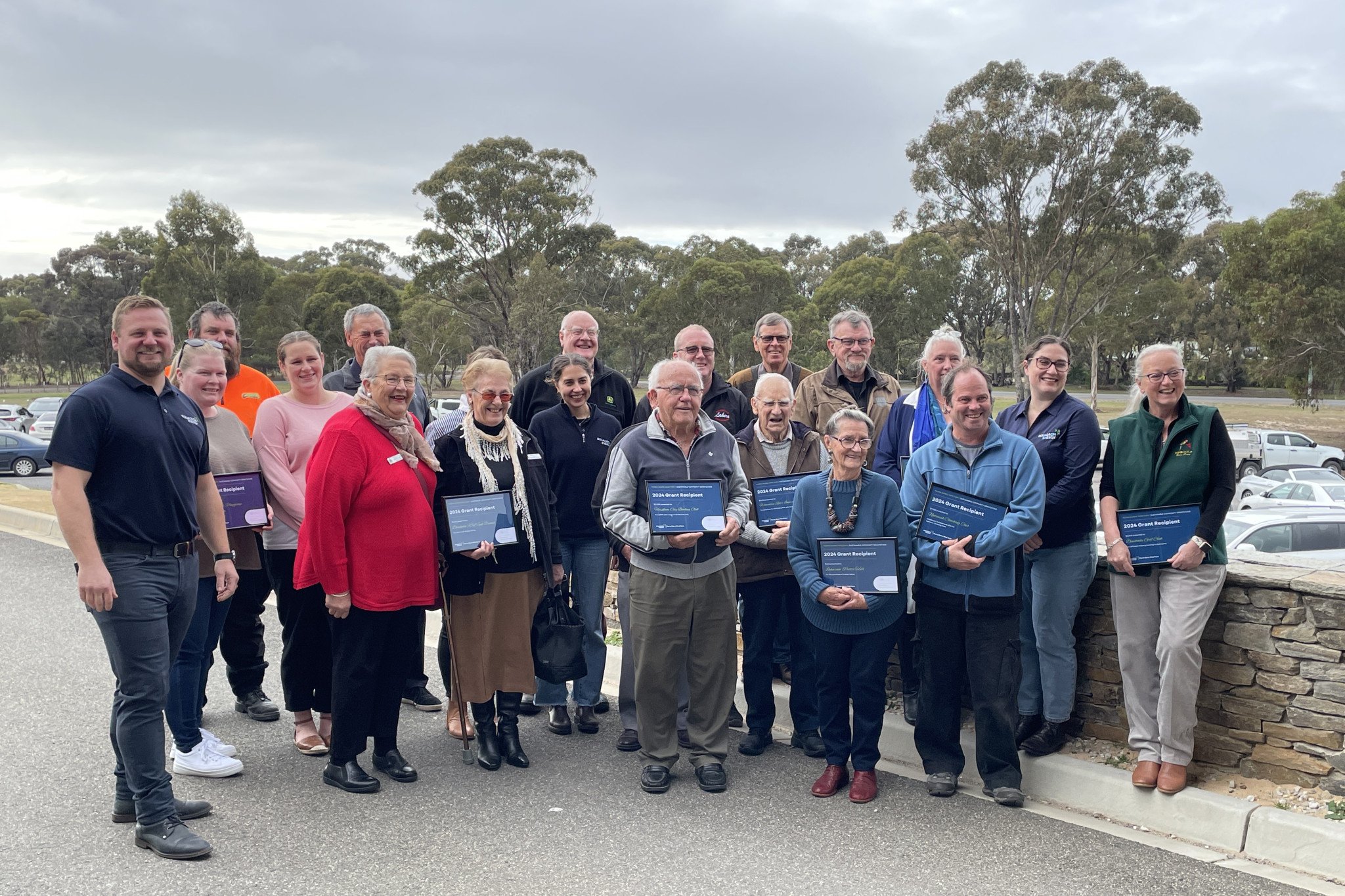 Representatives of Wimmera community groups hold their presentation certificates after receiving grants from Murra Warra Wind Farm at Horsham Golf Club on Wednesday. PHOTO: Caitlin Menadue