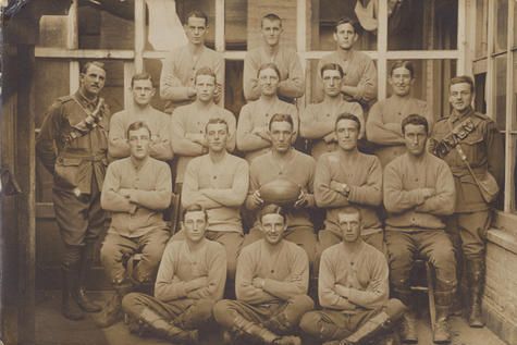 Walter Cossar Hood Sr poses second from left in the third row in Poperinghe, France, in 1916. The group portrait is of members of the Australian rules football team of the 9th Battery, 3rd Field Artillery Brigade, who were unbeaten between February and November 1916 and were known as the "Battery 18".
