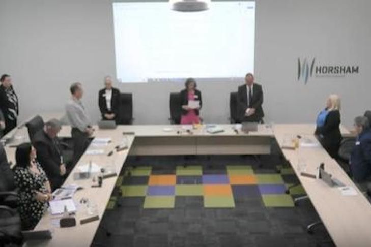 Mayor Robyn Gulline leads prayers at her final council meeting. Photo: HRCC