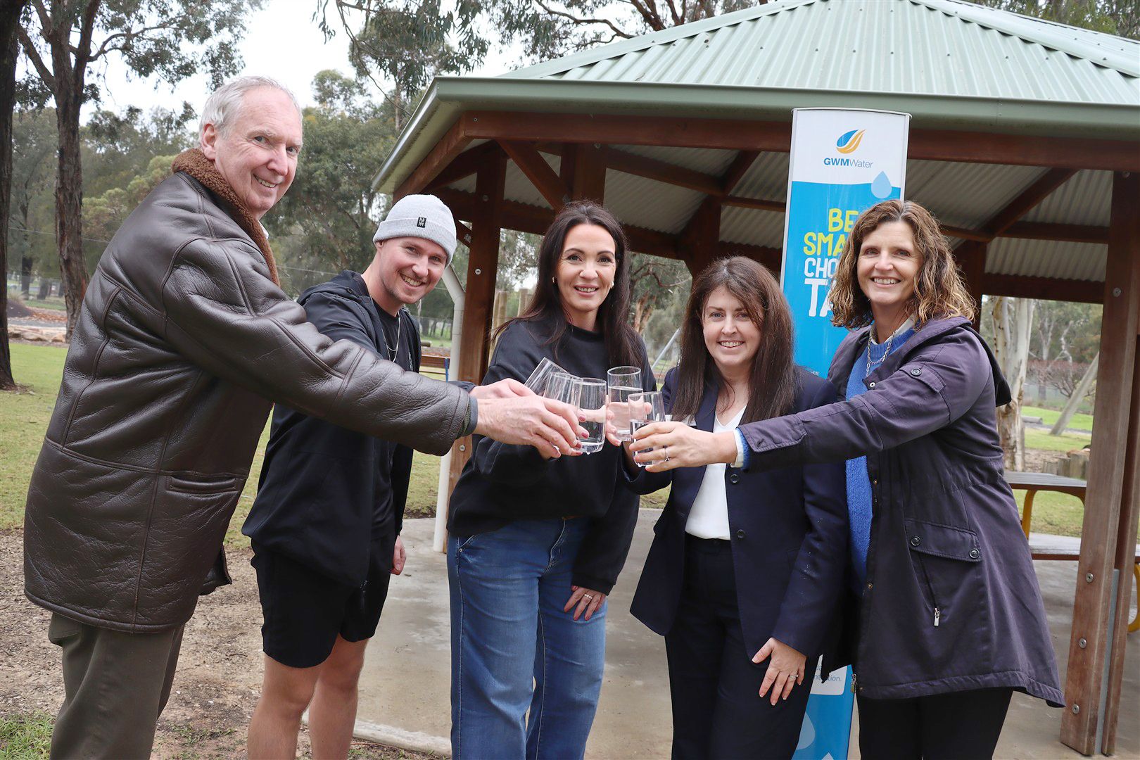 Celebrating some refreshing Dimboola water to drink in Kaniva is (from left) West Wimmera Shire councillor Richard Hicks, Kaniva College teacher Dylan Feduniw, Progress Association secretary Courtenay Wallis, GWMWater acting managing director Sally Marshall and GWMWater chair Caroline Welsh.