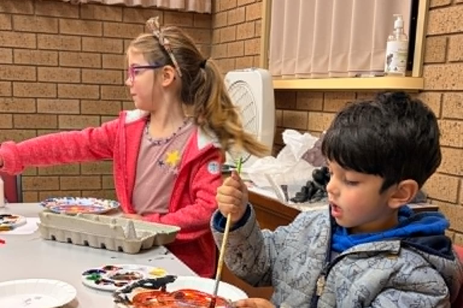 Little artists Rahli and Jordan busy crafting something different.
