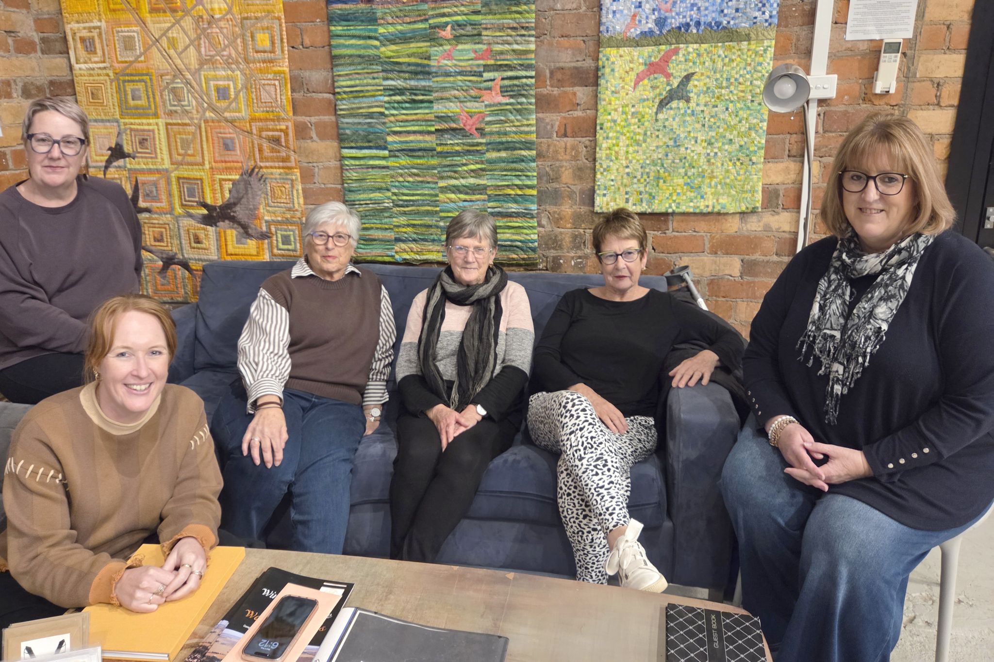 Pictured celebrating are committee members Tahia Durie (LEFT, FRONT), Katrina Frewin, Nina Gould, Barbara Hallum, Margaret Burdett, and Robyn Hul. Not pictured are Maryanne Ferguson, Peter Frewin, and Susan Pearse.