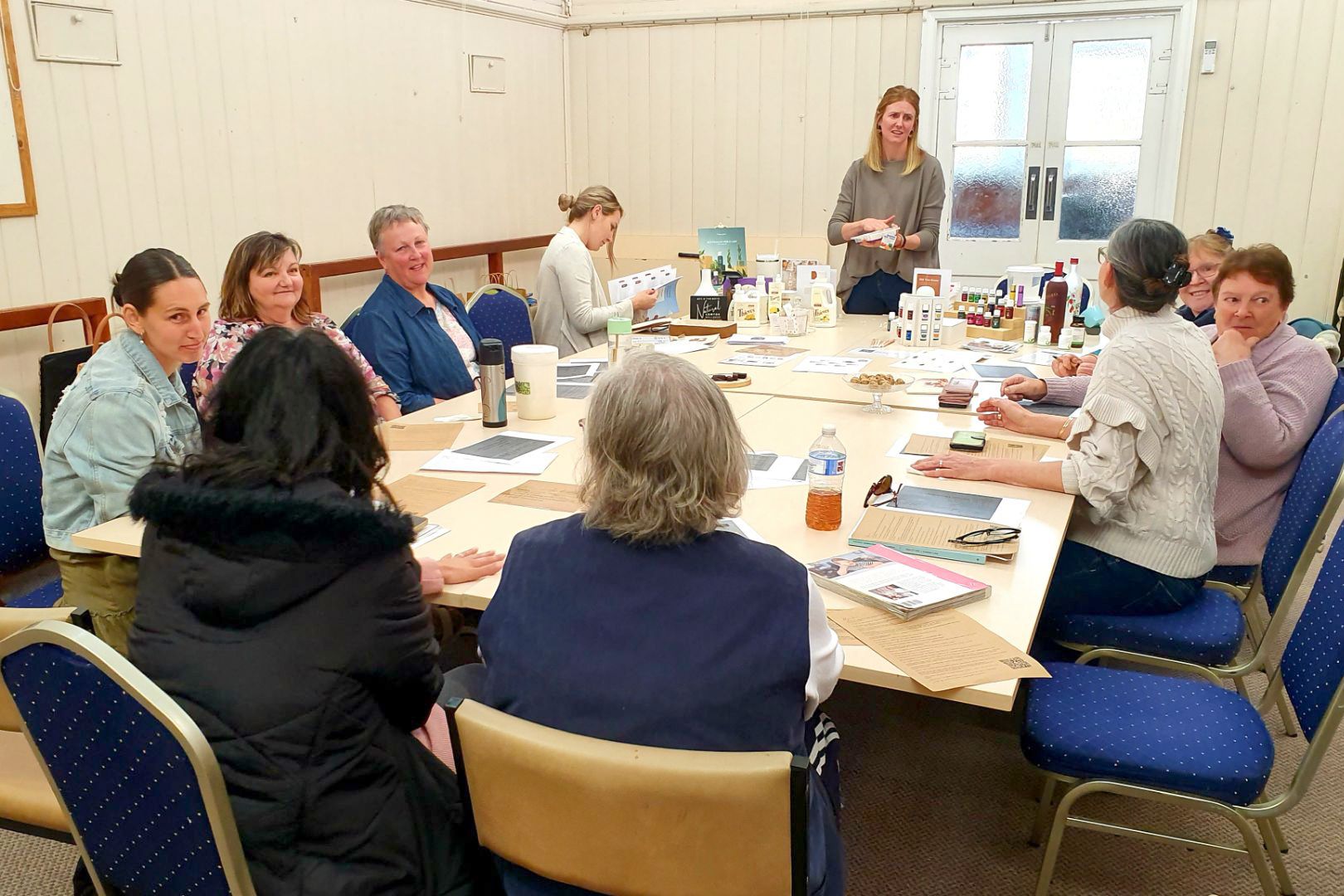 Rainbow ladies gather to learn at the Low-Tox Living information session.