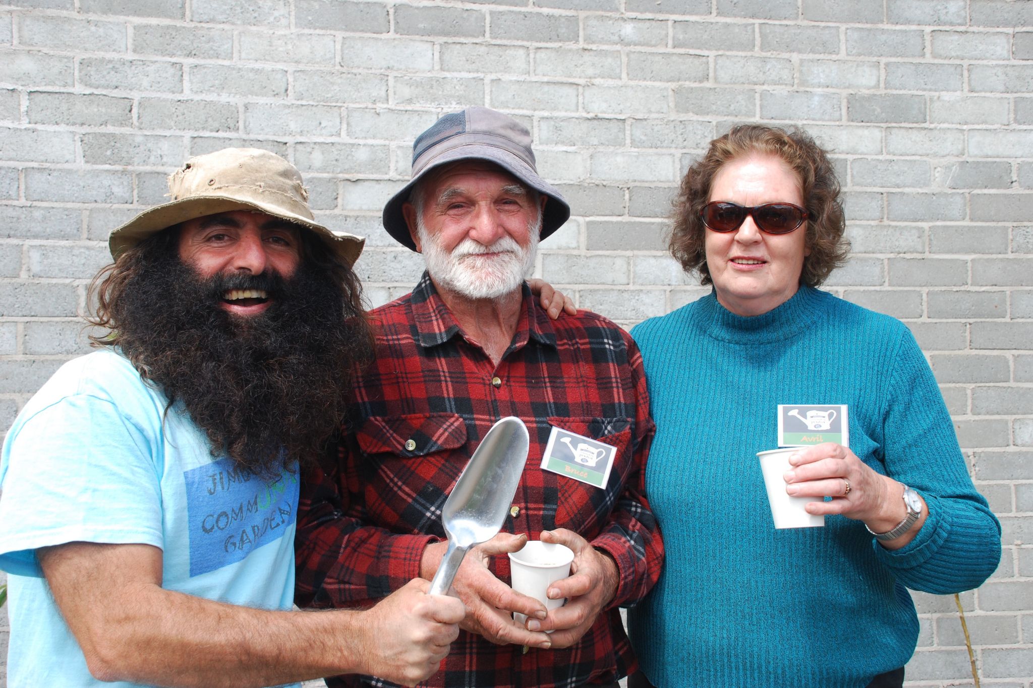 Costa Georgiadis with Warracknabeal Community Garden founding members Bruce and Avril Hein in 2016.
