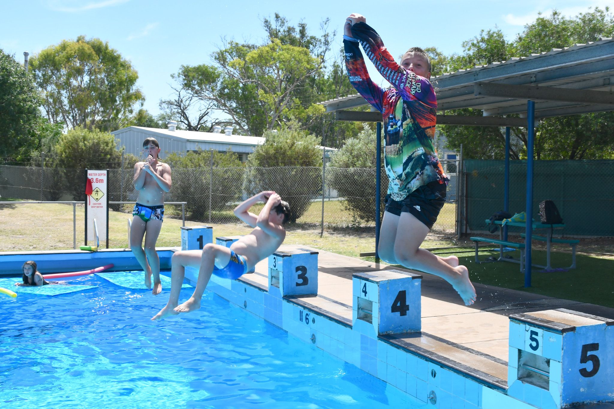 Dimboola kids Sydney, 12, Hamish, 12, and Hamish, 12, are having a blast diving into the Dimboola Swimming pool last year.