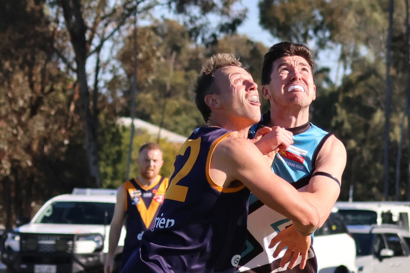 Austin Merrett and Keiran Delahunty battle it out during a throw-in.