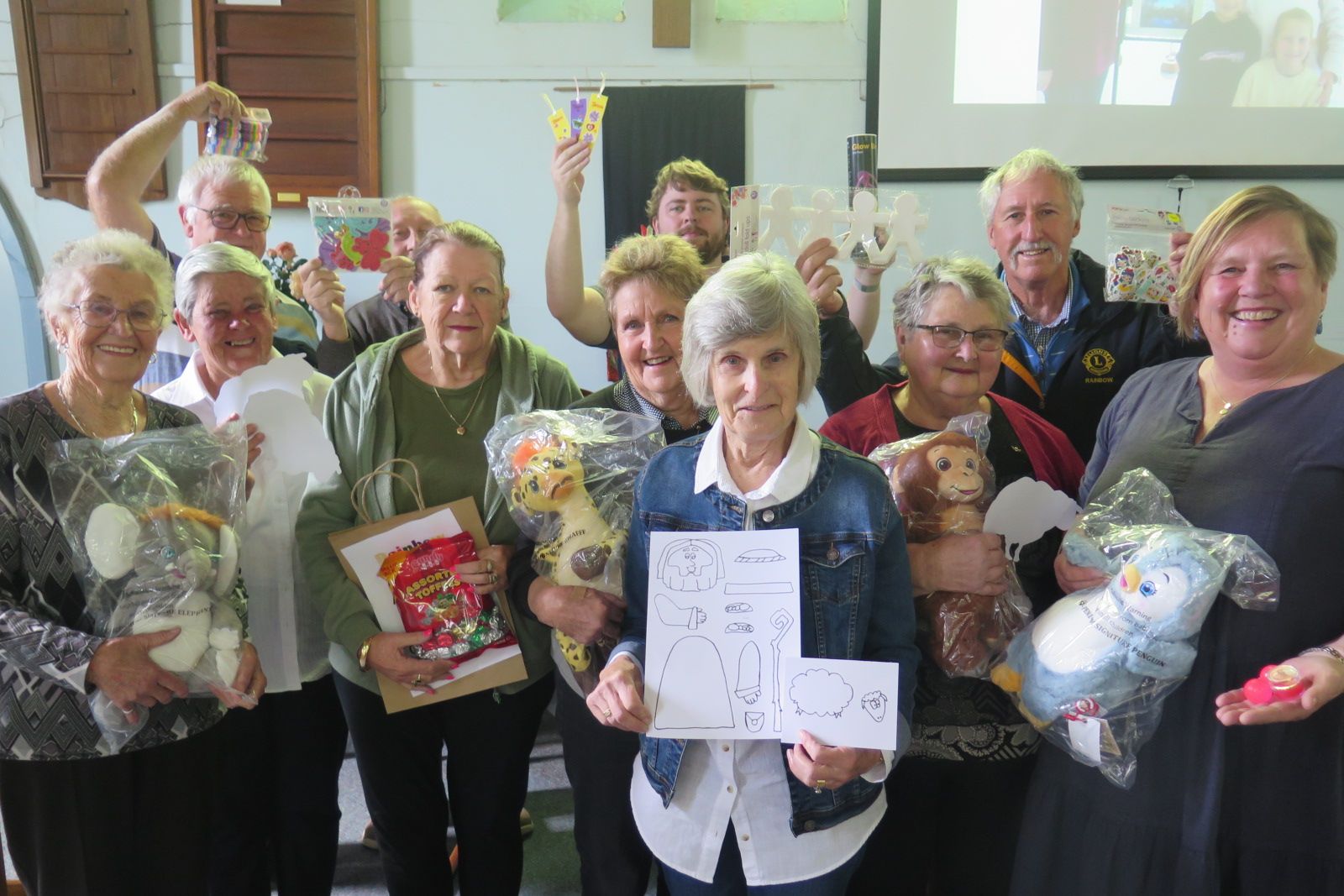 Members of the Southern Mallee Co-Operative Parish hard at work putting together the Show Bags with these fun items - bigger and better than last year! Back, left to right: Daryn Clugston, Graeme Smith (obscured), Sean Hill, Wayne Nitschke. Front, left to right: Nola Smith, Marg Mellington, Judy Young, Elaine Nitschke, Joy McLean, Joan Harmer, Pam Clugston.