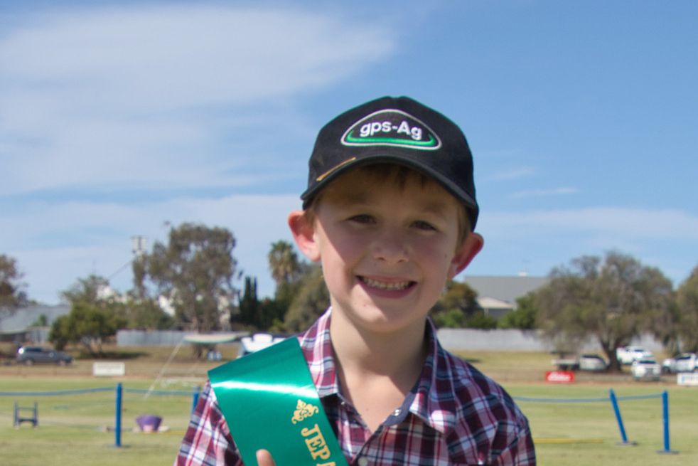 Wyatt Littlejohns thanks the crowd and judges with a big thumbs up as he is crowned the 2024 Showboy.