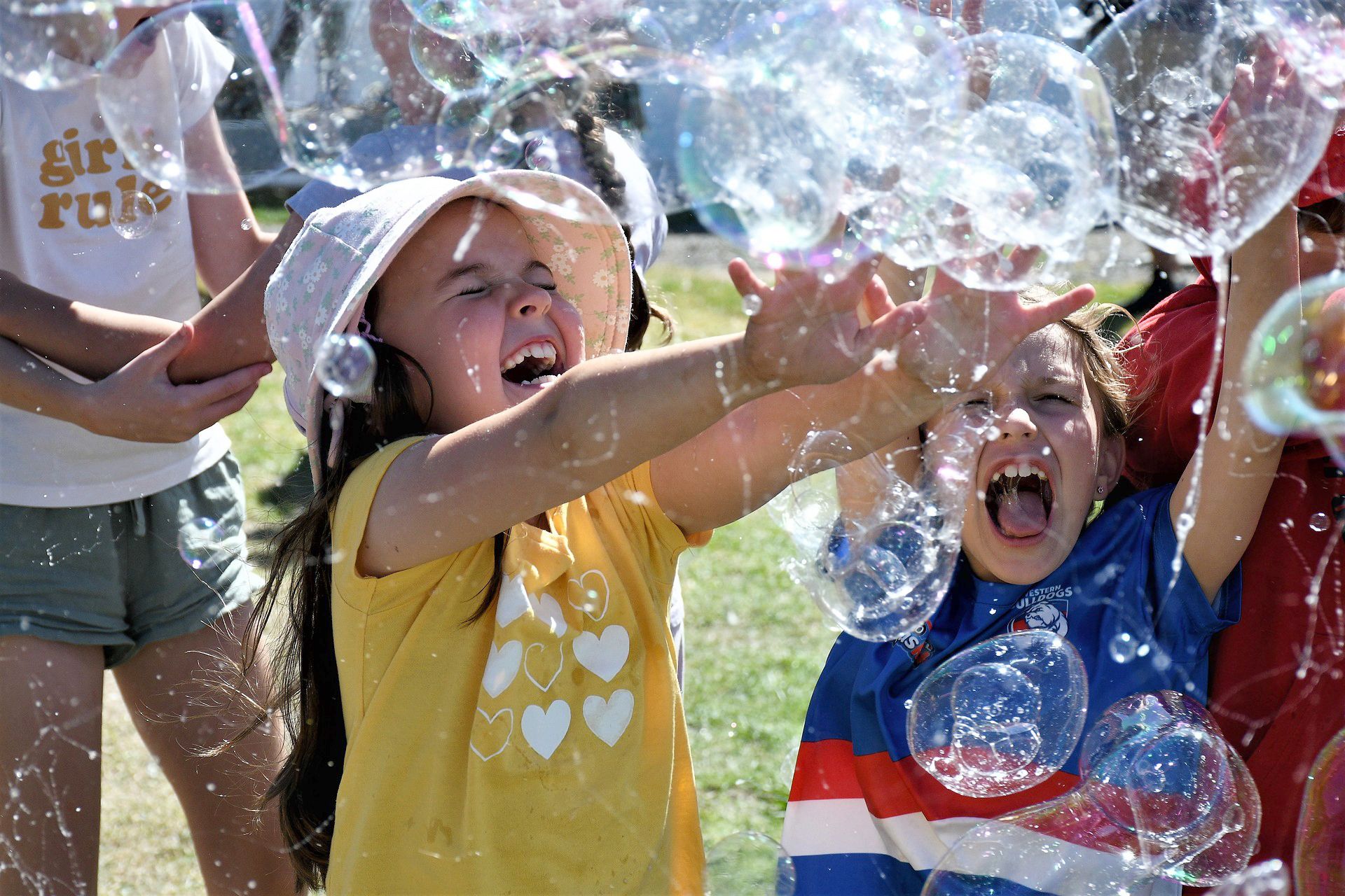 Evie, 7, and Mackenzie, 7, having a ball at the Natimuk Show in 2024. Photo: AMY JUDE