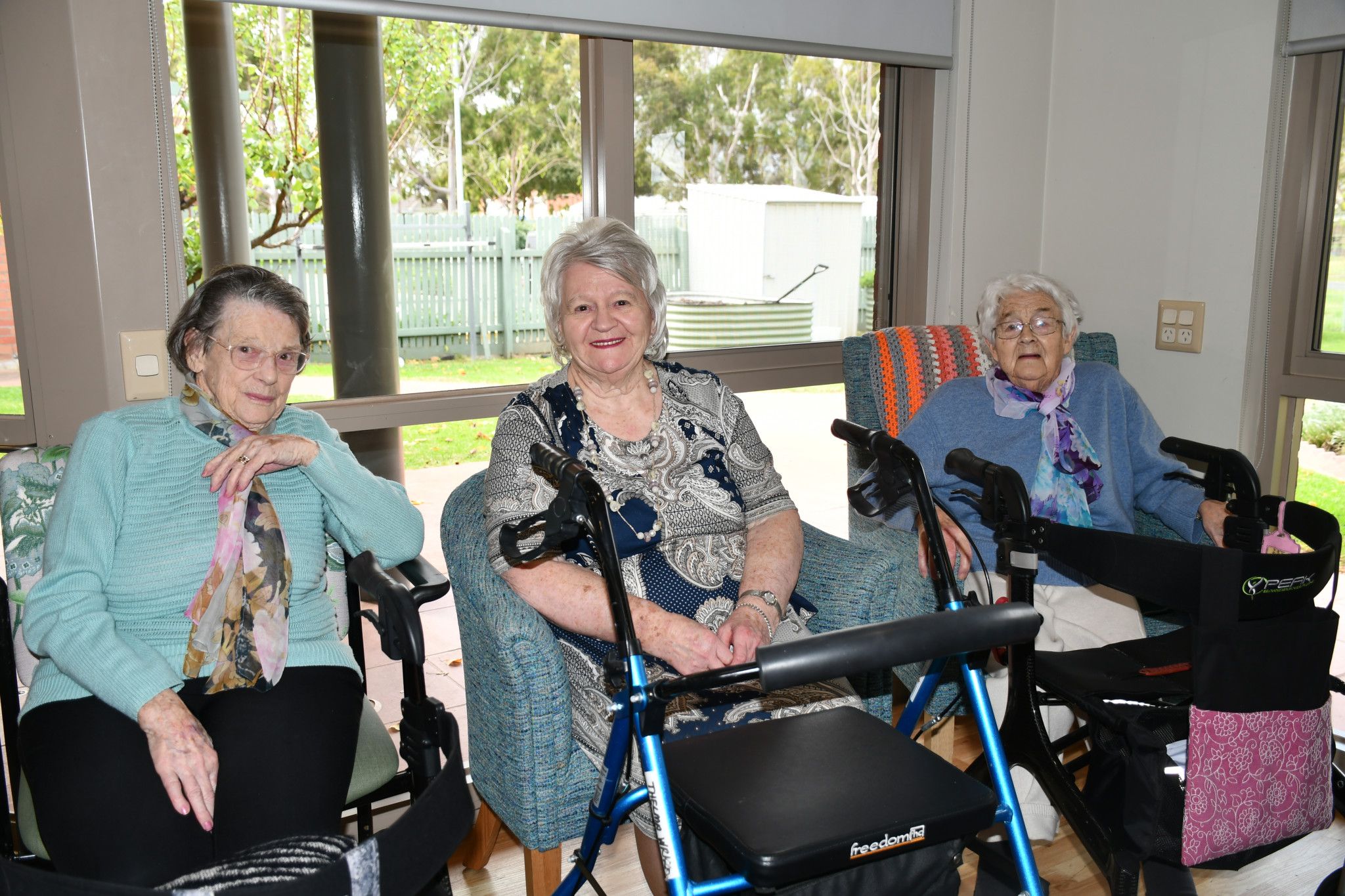Dawn Robinson, Thelma Wrigley and Jill Walsgott are all smiles during the Mother's Day special hi-tea.