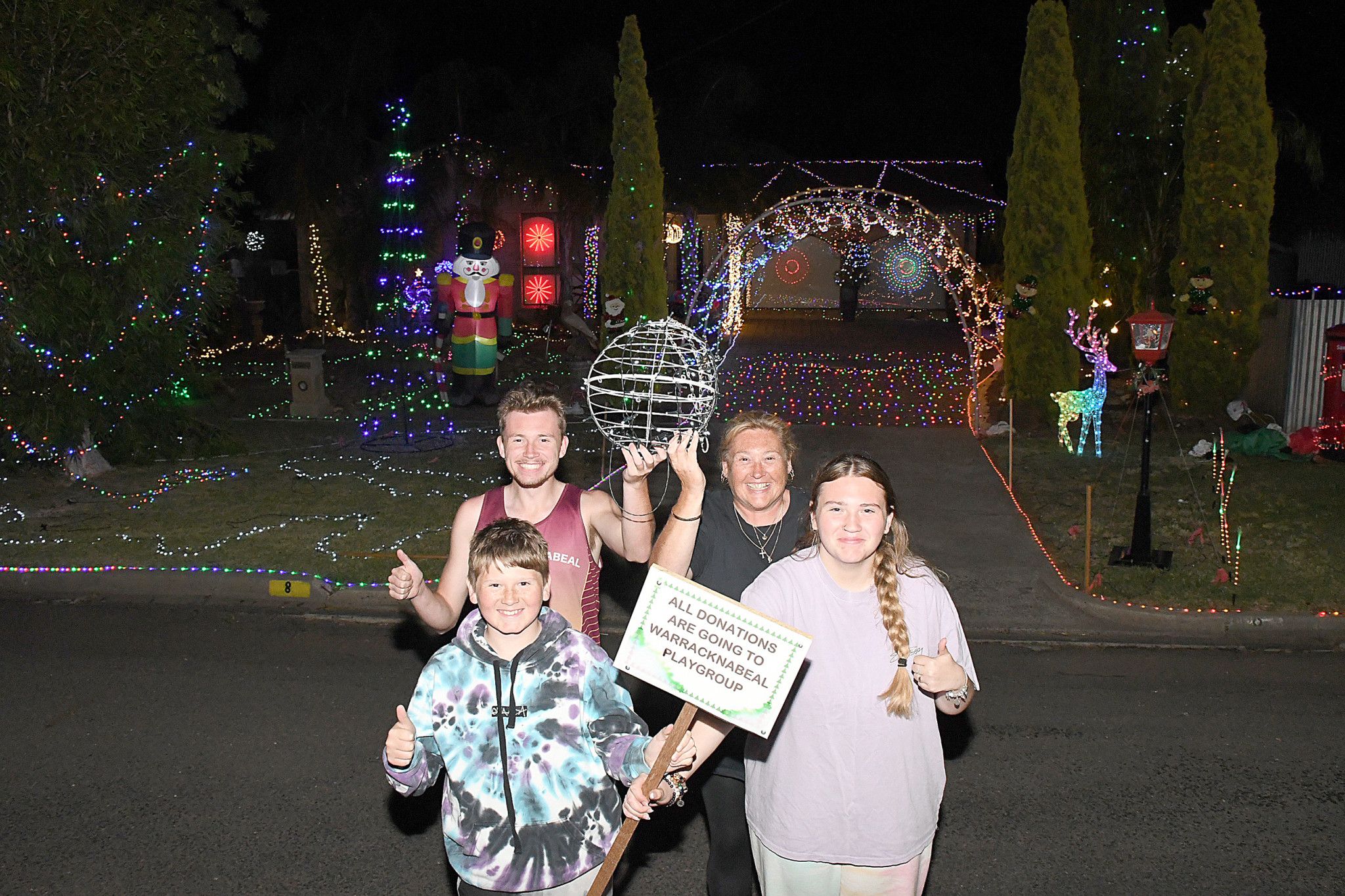 Tynon, Tennillle, Zander and Millie Jonasson (Dad, Clinton was absent) have been working hard to have their spectacular home Christmas display ready.
