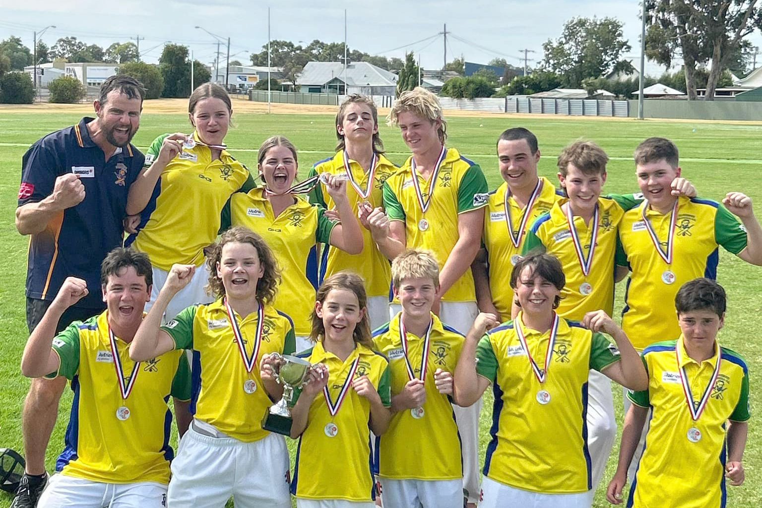 The players celebrating their success.
