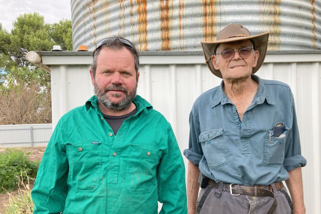 Terry Miller (right) and his son Murray, who is also a wild dog trapper