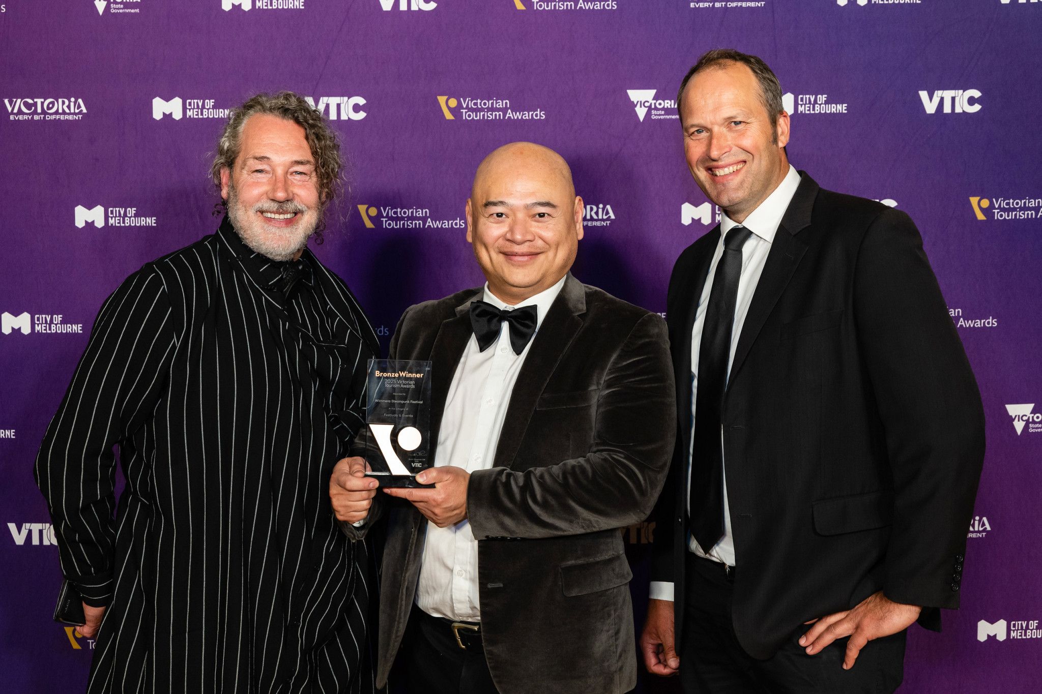 Perserverance pays off. Standing with the bronze award for Festivals & Events in the 2025 Victorian Tourism Awards is Jamie Ouy, Chan Ouy and Grampians Wimmera Mallee Tourism chair, David Jochinke. The winner was Phillip Island&rsquo;s Island Whale Festival and runner-up, Adventure Park Geelong's Winter Glow Festival.