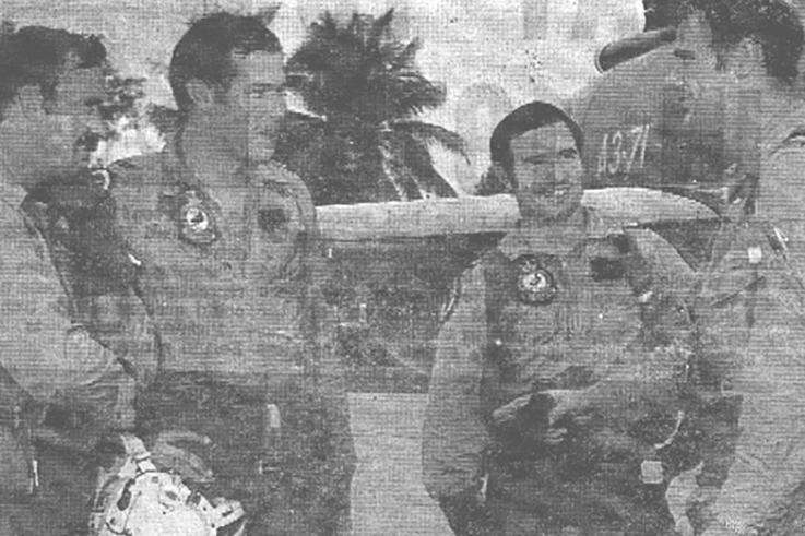 PAUL IS TOP PILOT: Among the four pilots pictured is former Hopetoun boy Paul Kaye (third from left). The four pilots from No 75 Mirage squadron, RAAF, are pictured discussing exercises over Singapore.