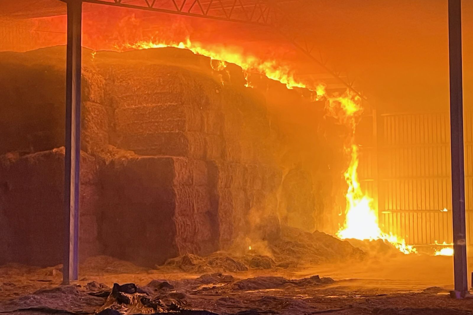 Hundreds of hay bales destroyed in Sheep Hills fire.