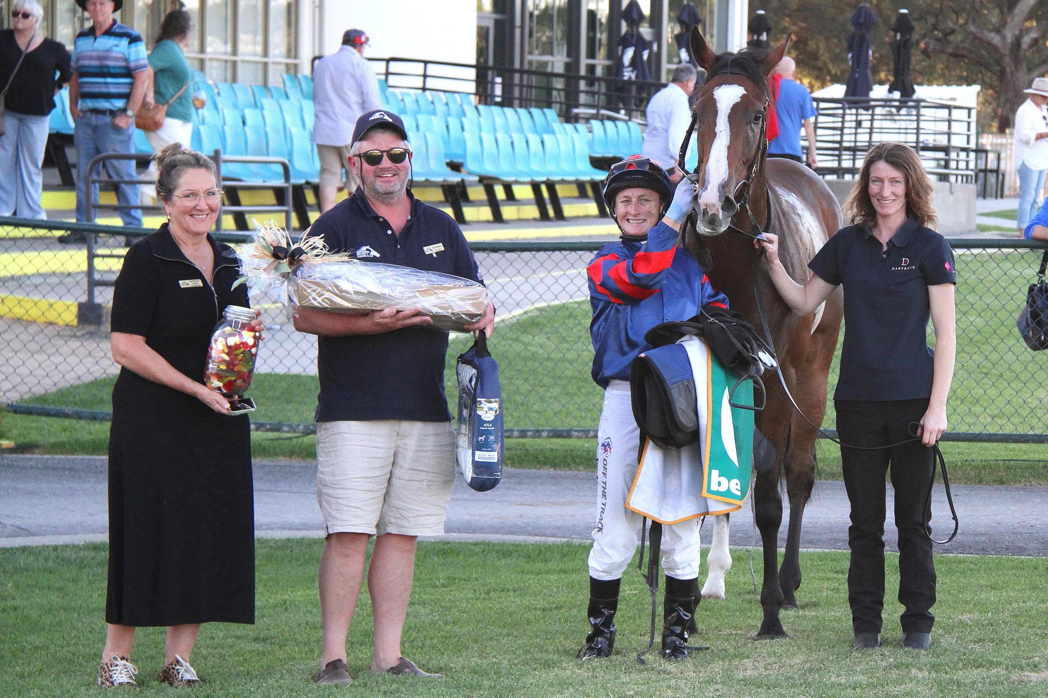 The Horsham racing community came together to honour the late Dallas Rintoule in a heartfelt memorial race this week. Horsham & District Racing Club manager Charmayne Parry (left) and vice chair Pop Murray presented race-winner Linda Meech (pictured with Tangoette and Lorelle Crow) with prizes donated by local jockeys Dean Yendall and Christine Puls. Picture: MATTHEW RIGBY