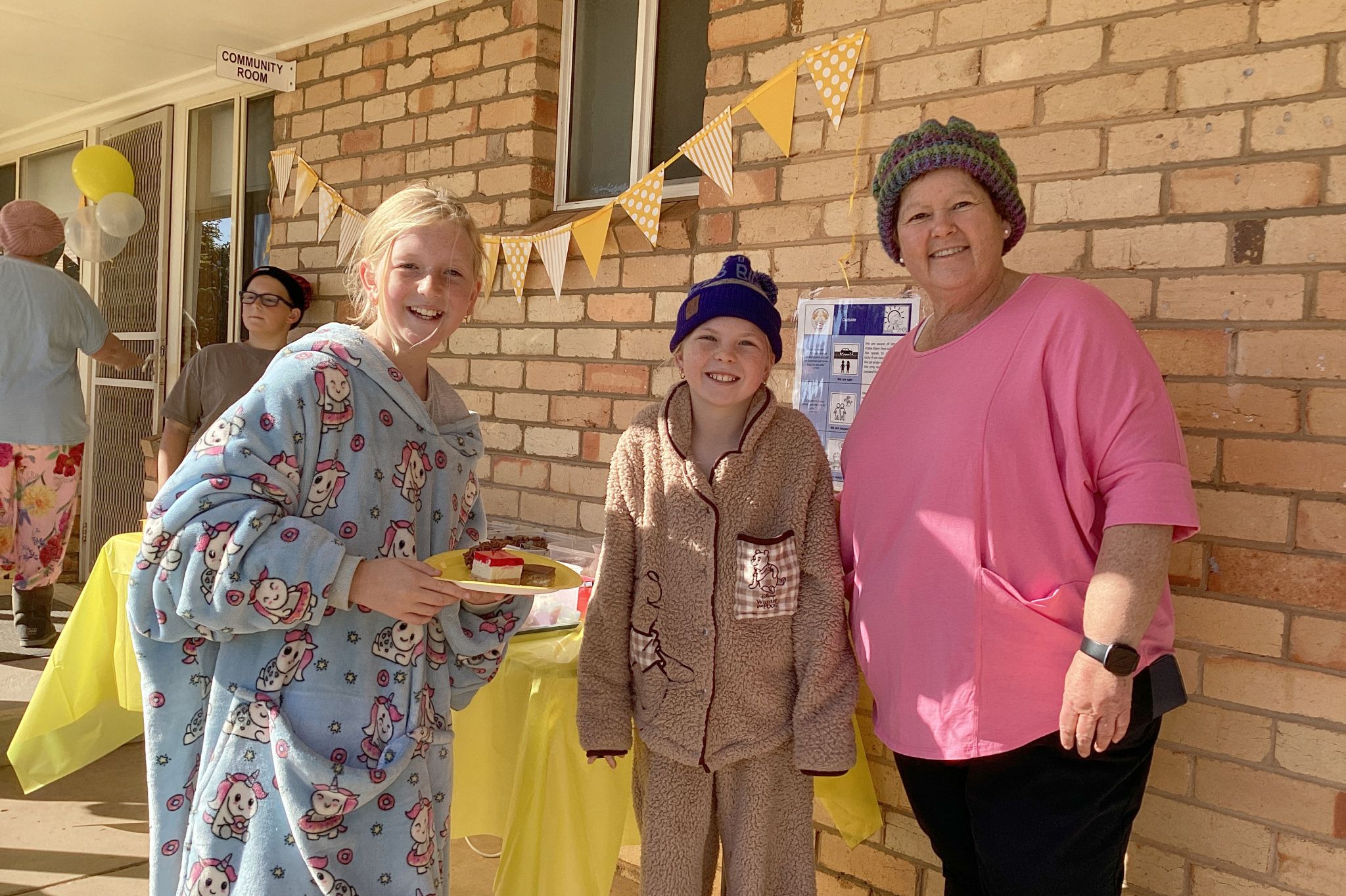 St Joseph's students Millie and Ariat, with the school's principal, Cynthia Maiden, are celebrating PJ & Beanie Day at the school on Friday, May 22. A total of $730 was raised throughout the day, as the Grade 5/6 students provided slices, cupcakes and other treats for students and families to purchase.