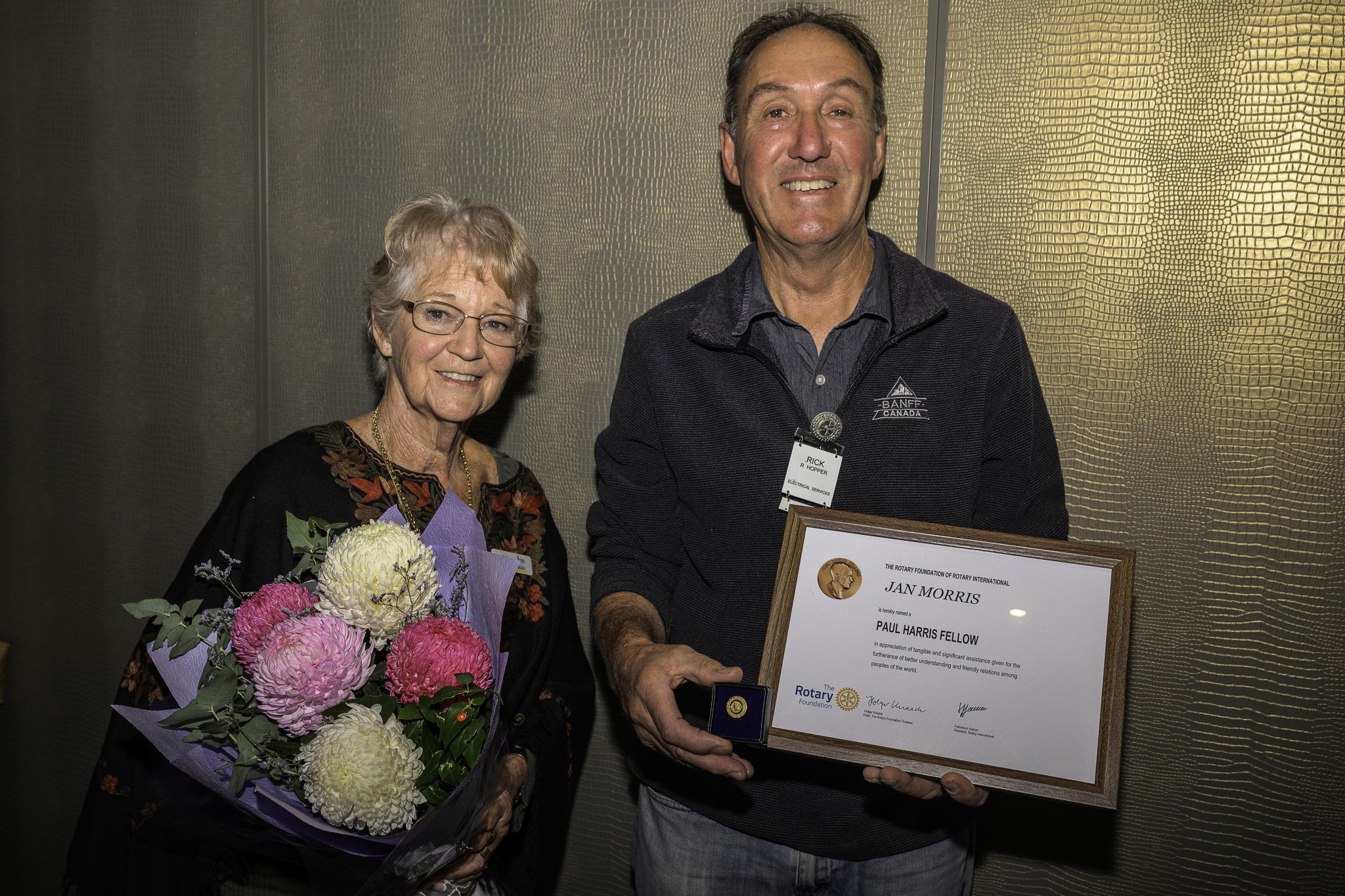 Horsham's lifetime volunteer, Jan Morris, receives a Paul Harris Fellow from the Rotary Club of Horsham East president, Rick Hopper, after being surprised at the presentation ceremony.