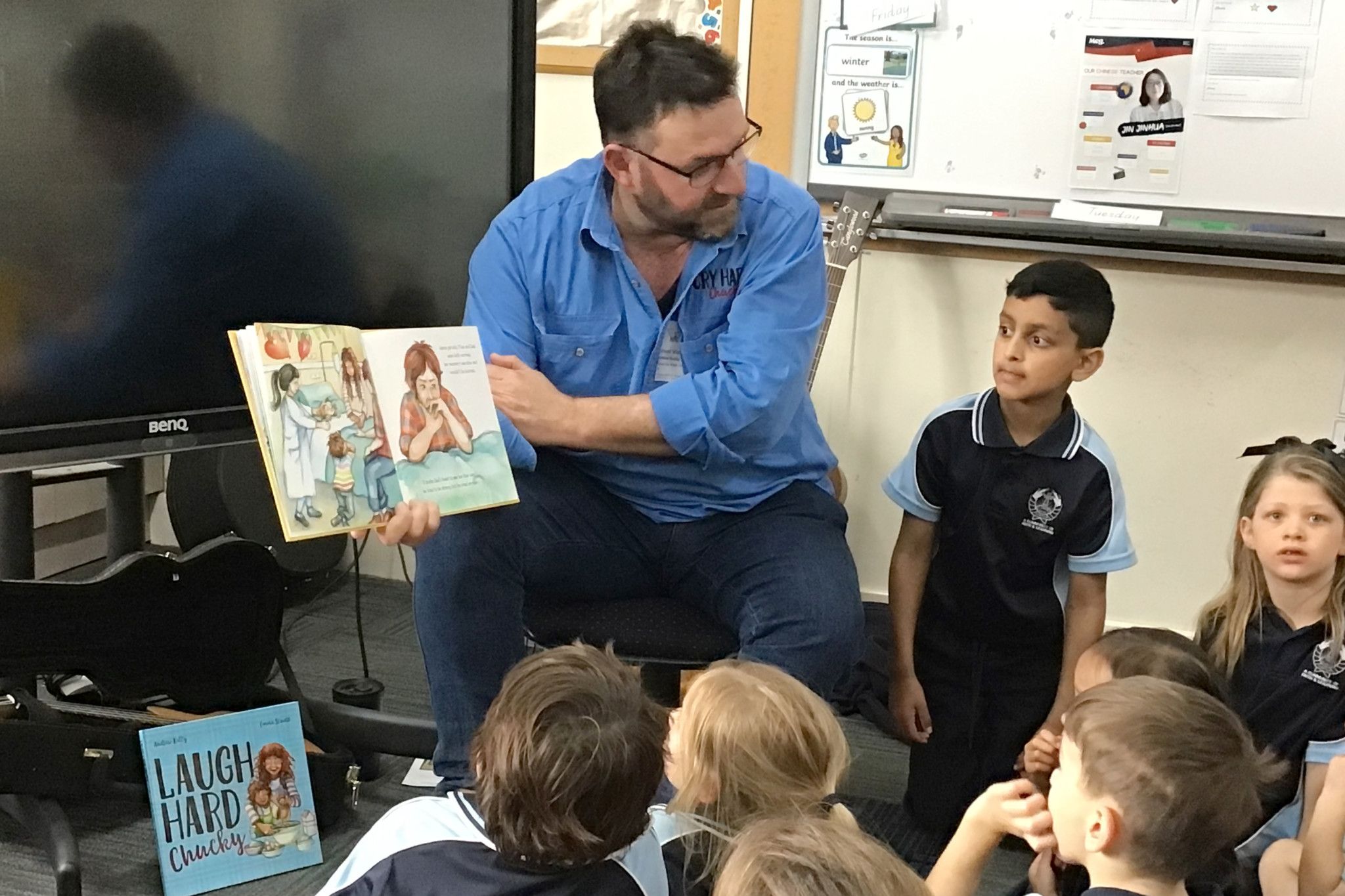Author Andrew Kelly reads 'Cry Hard Chucky' during his visit to St. Joseph's School.