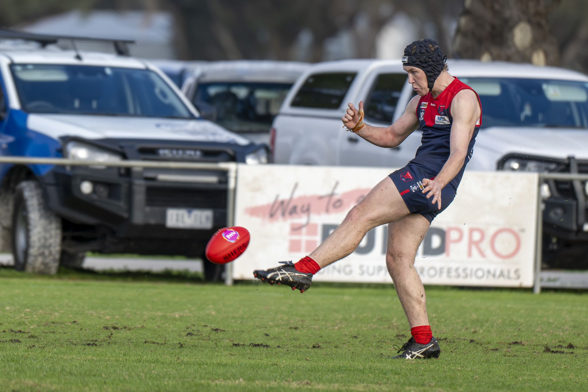 Laharum's Josh Hutchinson kicks away during his side's round-10 clash against Kalkee. The Demons' forward was one of the best on ground as he helped guide his side to an 8.17 (65) to 3.7 (25) victory.