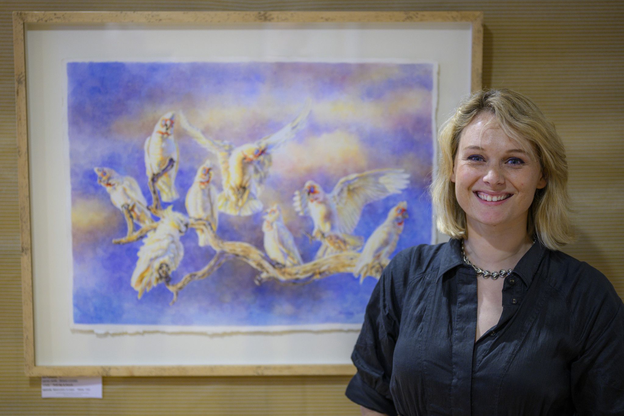 Art fair judge Pippa Mott with Meagan Lonsdale's work Pull up a Perch. Photo: ROBIN WEBB