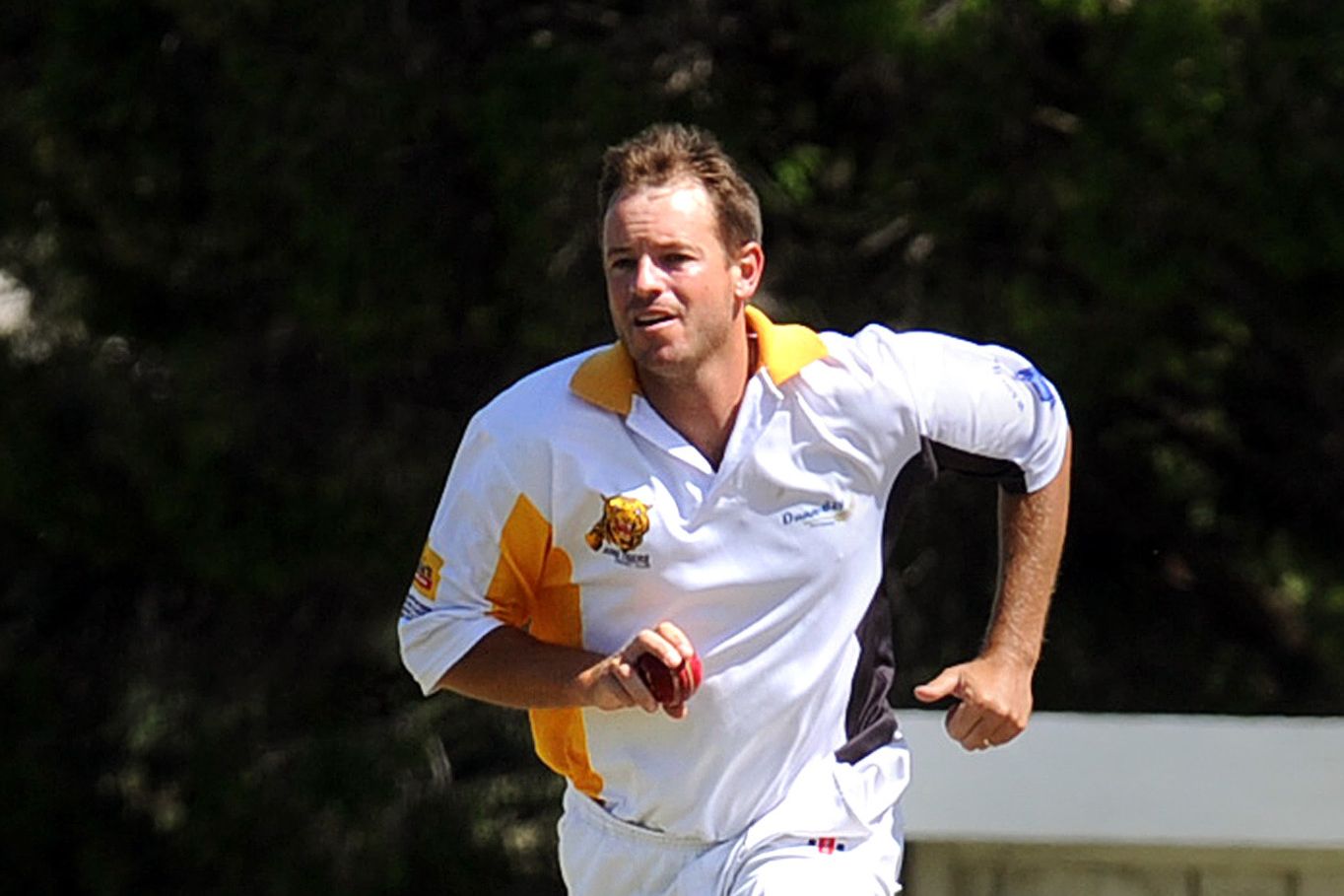David Puls steams in to bowl for the Jung Tigers during the 2009-10 season.