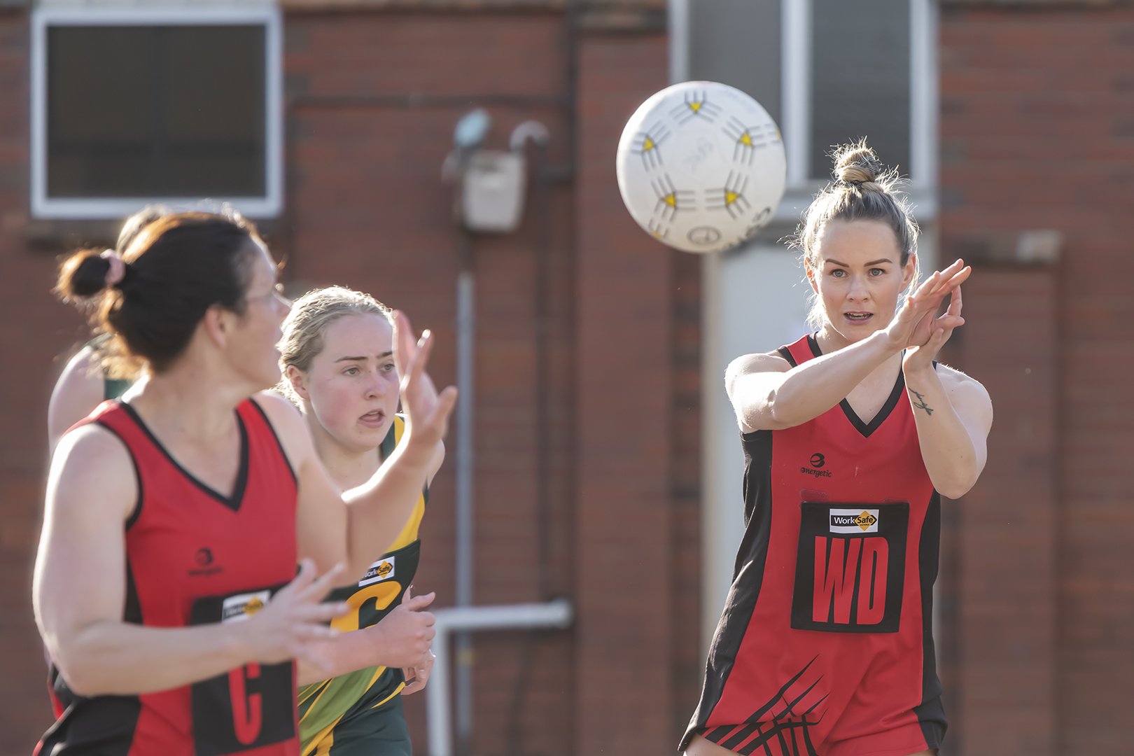 Stawell's Rachel Wood passes the ball to Jemma Clarkson against Dimboola in 2022. Wood is back this season and both are co-coaches.
