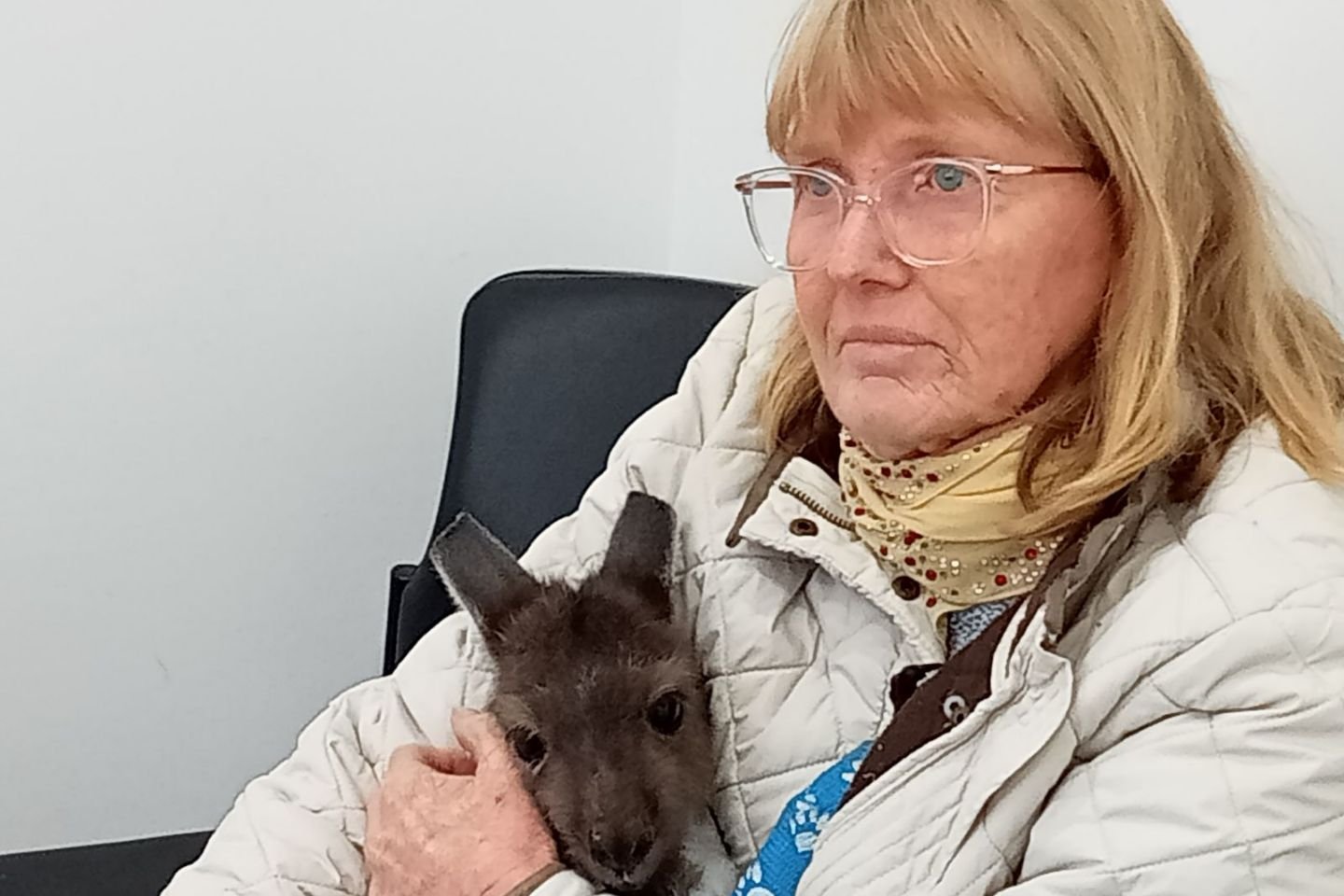 Wildlife carer Stacy Whitehorse with a rescued roo.