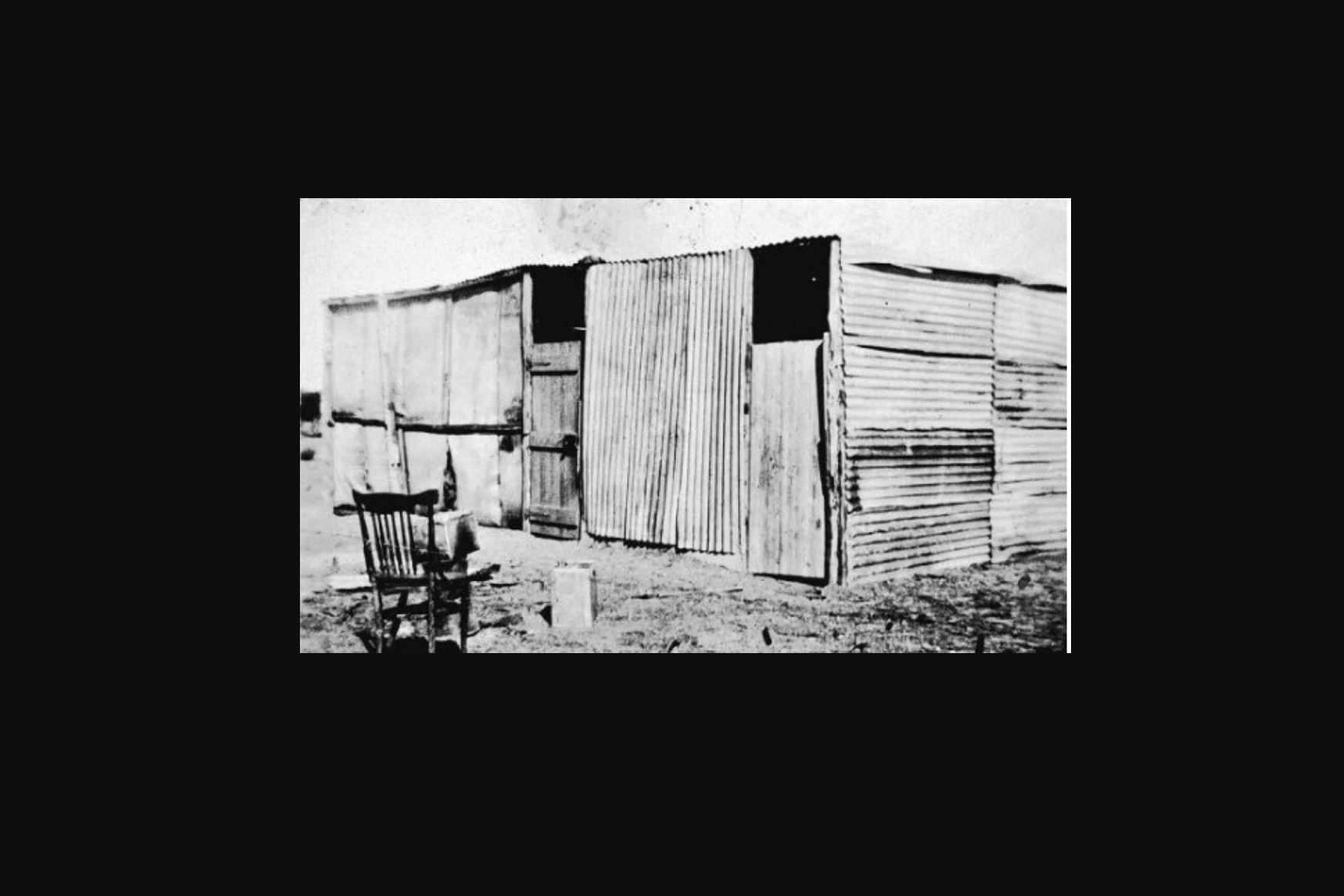 A Soldier Settlers first house in 1922, constructed of corrugated iron and hessian.