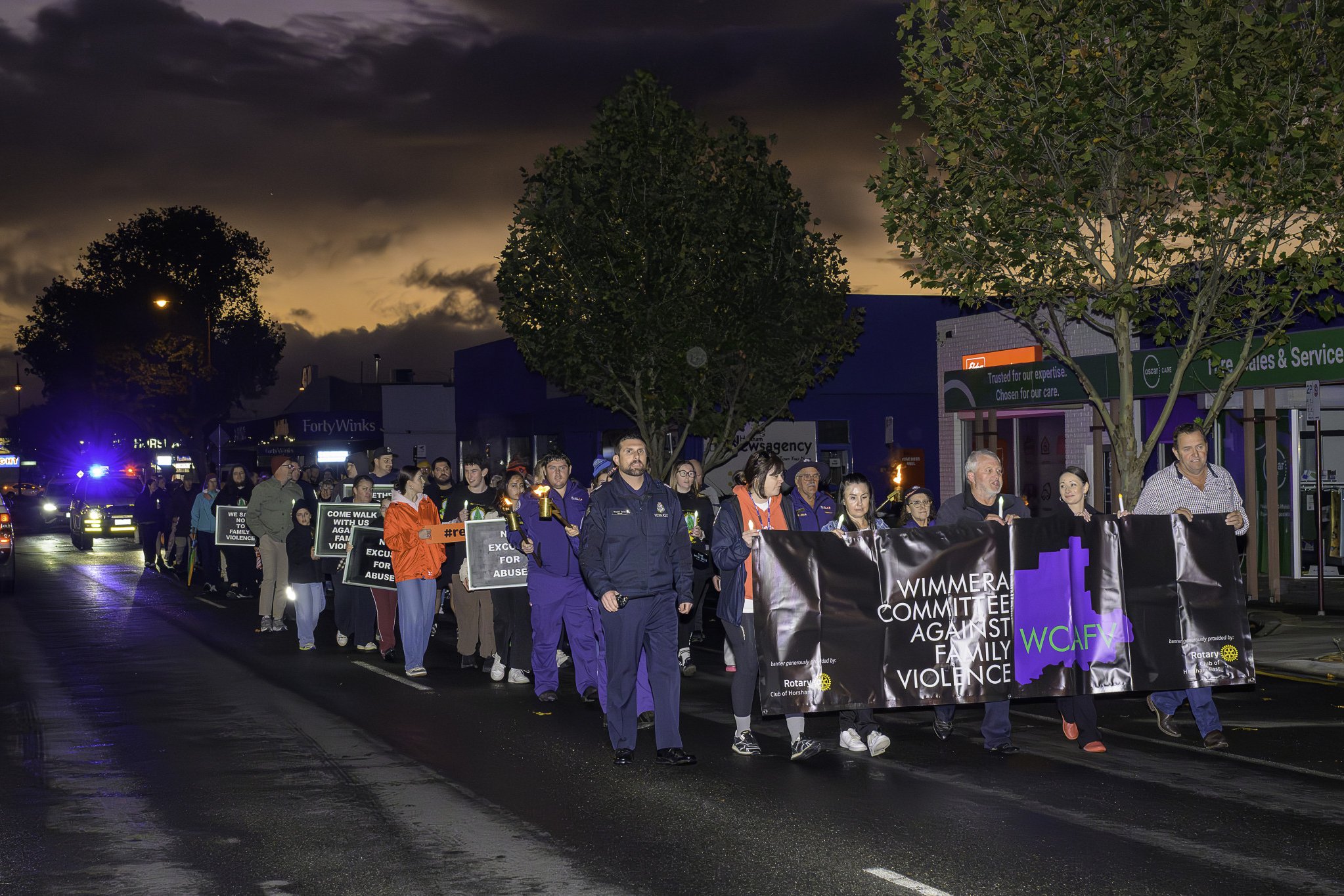 Community members take part in the 'Shine the Light on Family Violence' candlelight walk in Horsham on Monday night.