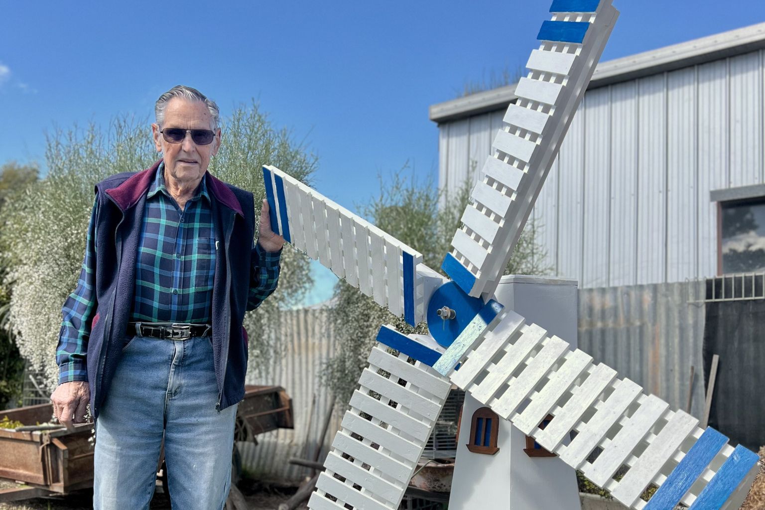 At 92, Hopetoun's Wilf Webster stands proudly with the windmill he created from scratch. Inspired by a picture of it, which he found online, Mr Webster spent a few weeks building the decorative piece in his own shed, proving age is no barrier to creativity and craftsmanship.