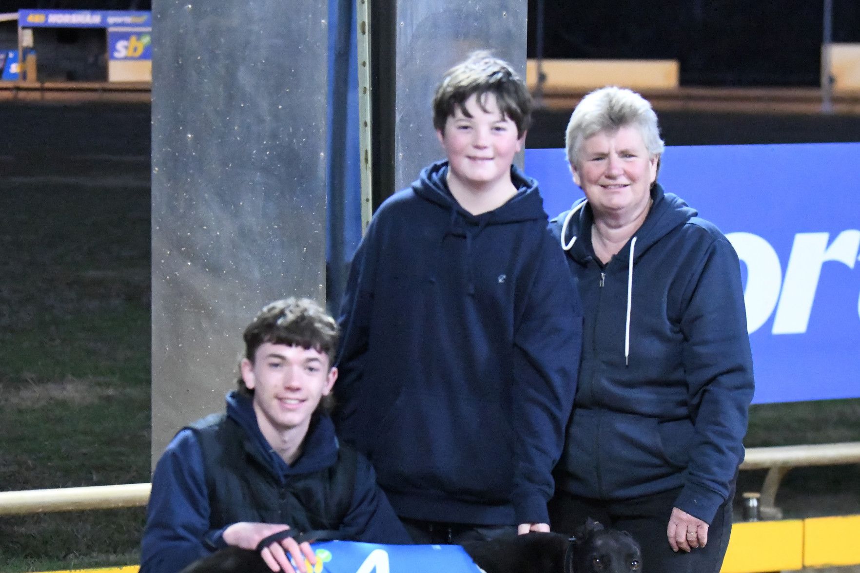 Yanic Bale with L-R Dezi Carter (Handler) and Jett Carter (Strapper). PHOTO: PETER CARTER