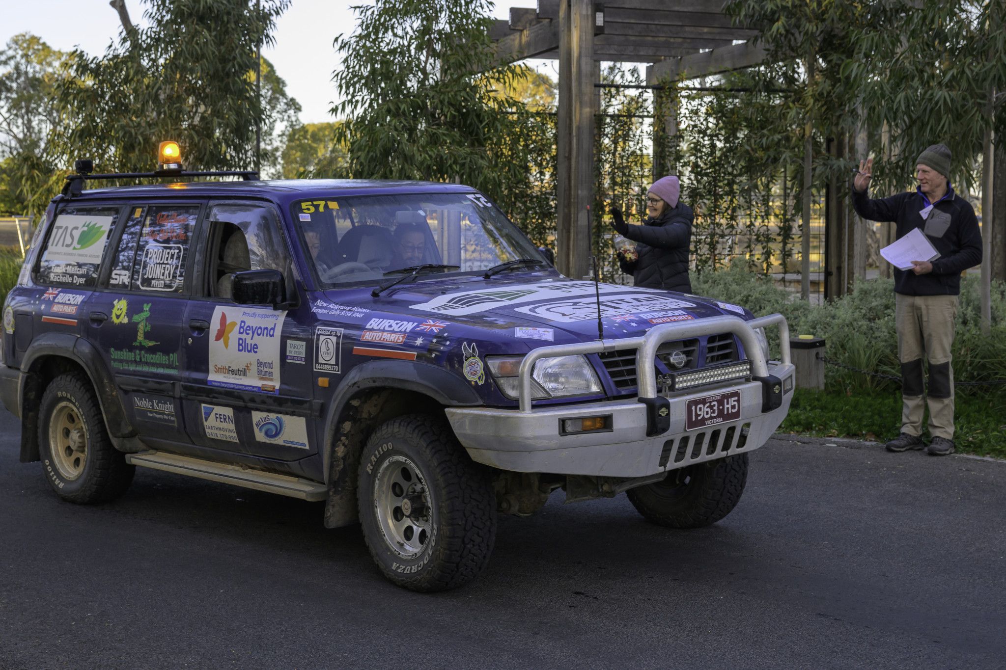 One of the Beyond Bitumen vehicles leaving after breakfast.
