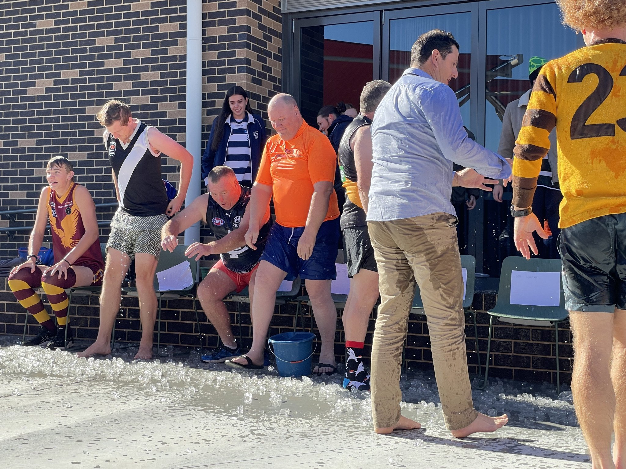 Cody Polack, Matt Fiedlieb, Mick Williamson, Kent Beveridge, John Bish and Cameron Whelan shake off the cold. PHOTO: CAITLIN MENADUE